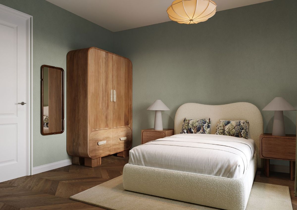 Bedroom with sage green walls and oak wardrobe